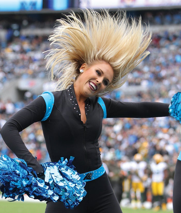 Students cheer reading at Carolina Panthers rally